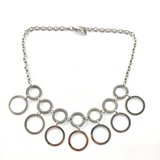 Collier en Acier Inoxydable – Cascade d’Anneaux Géométriques Collier en Acier Inoxydable – Cascade d’Anneaux Géométriques