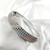 Bracelet en argent serti de pierres multicolores – Éclat et élégance Bracelet en argent serti de pierres multicolores – Éclat et élégance