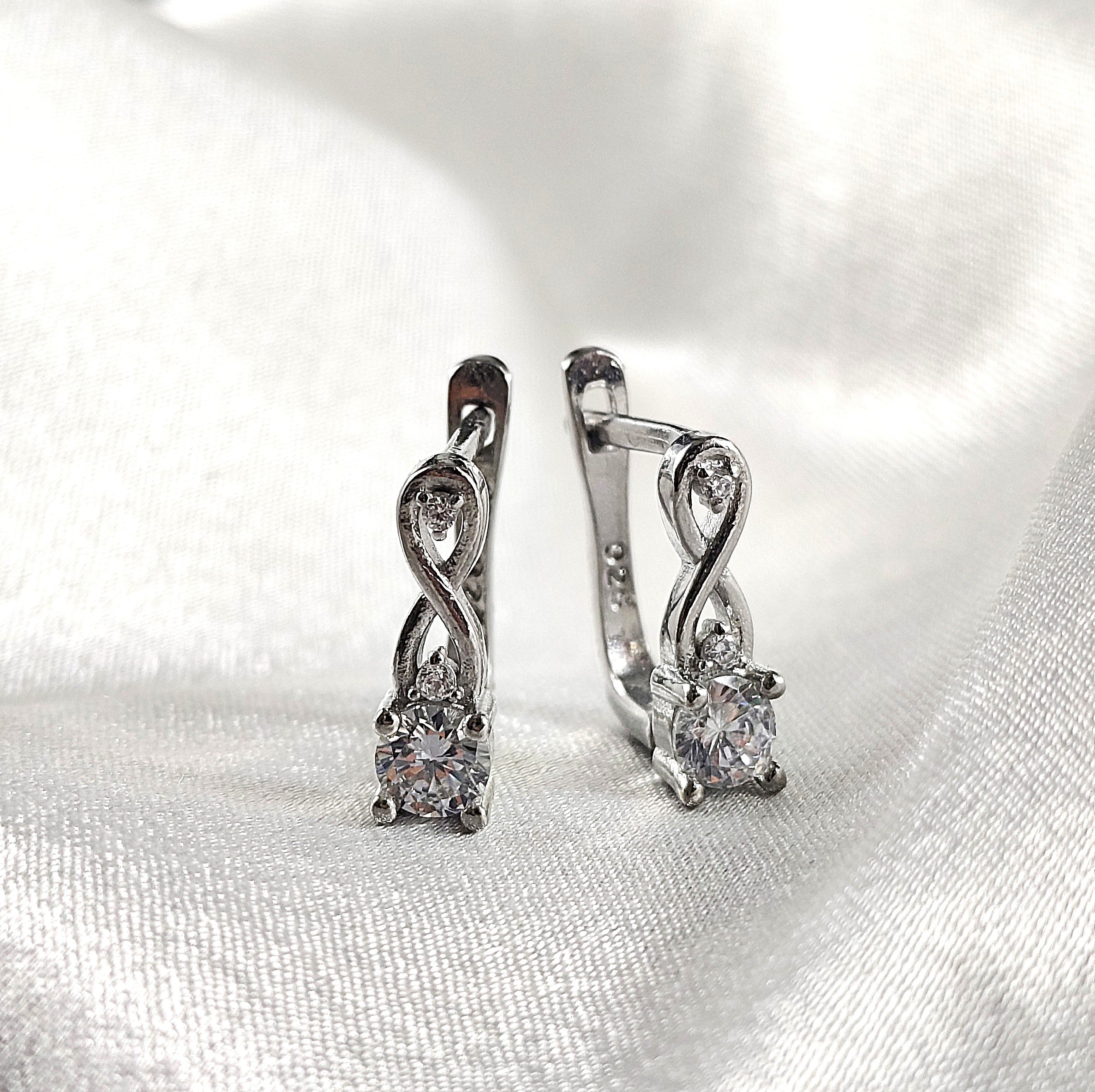 Boucles d’Oreilles “Élégance Infini” en Argent Boucles d’Oreilles “Élégance Infini” en Argent