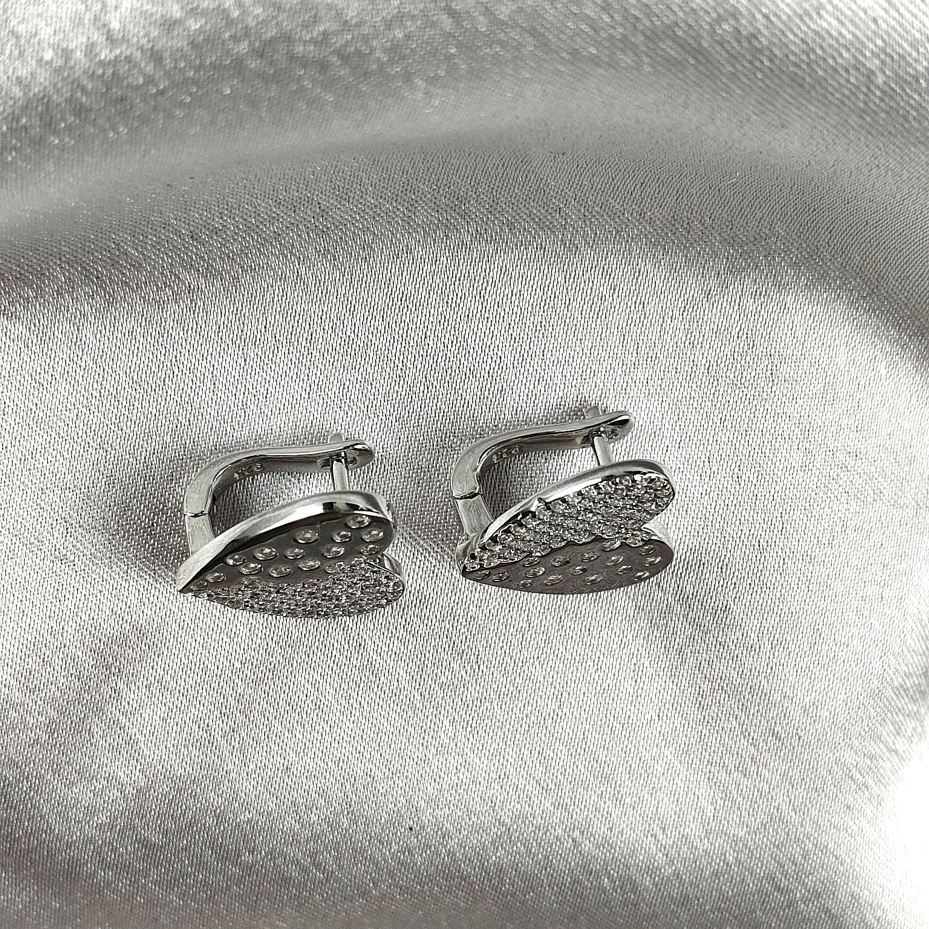 Boucles d’Oreilles “Cœur Scintillant” en Argent Boucles d’Oreilles “Cœur Scintillant” en Argent