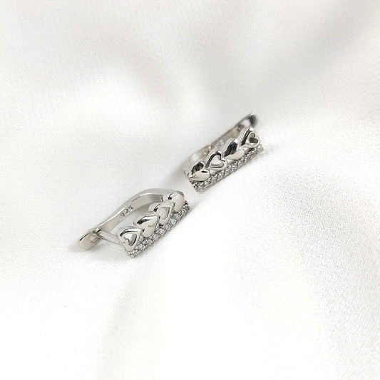Boucles d’Oreilles Cœurs Alignés en Argent 925 – Romance Éternelle