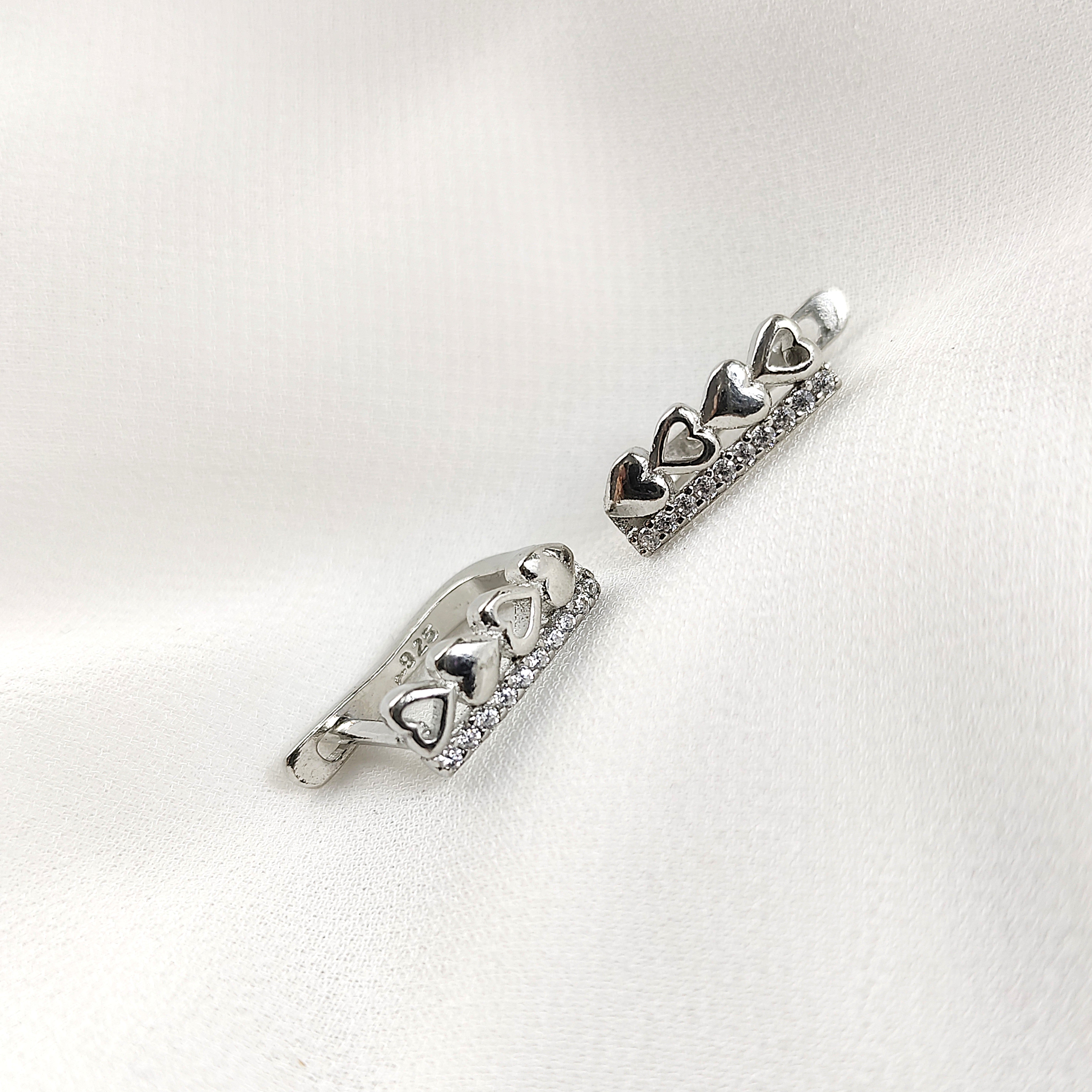 Boucles d’Oreilles Cœurs Alignés en Argent 925 – Romance Éternelle Boucles d’Oreilles Cœurs Alignés en Argent 925 – Romance Éternelle