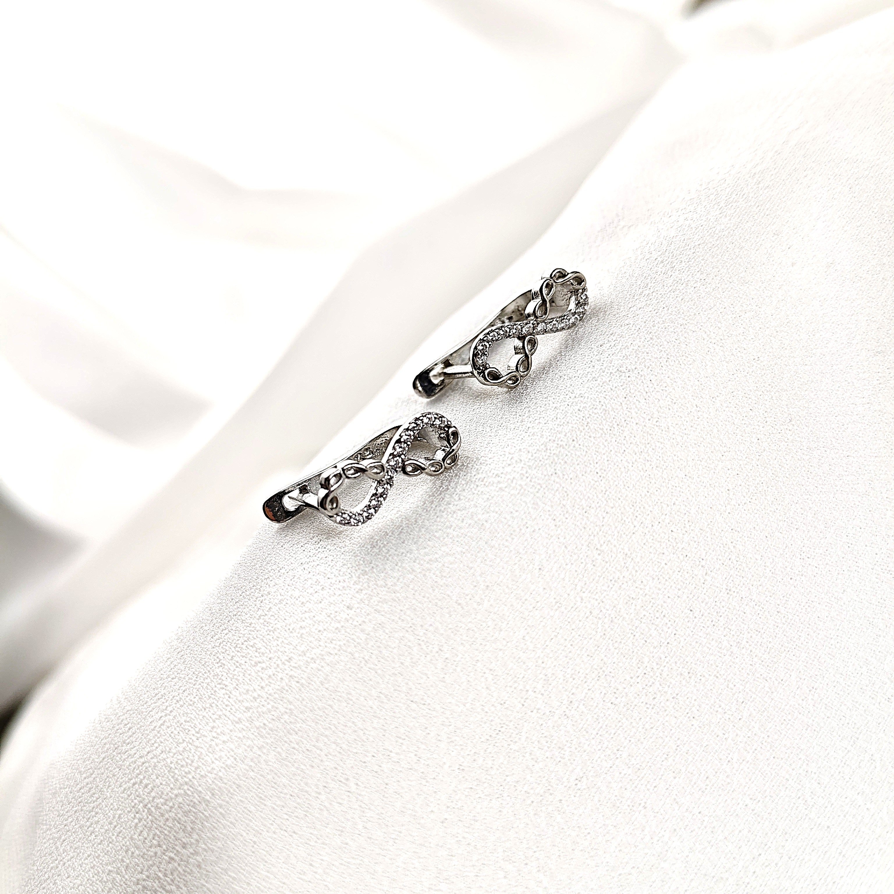 Boucles d’Oreilles Infini Éclatant en Argent 925 – Symbole d’Éternité Boucles d’Oreilles Infini Éclatant en Argent 925 – Symbole d’Éternité