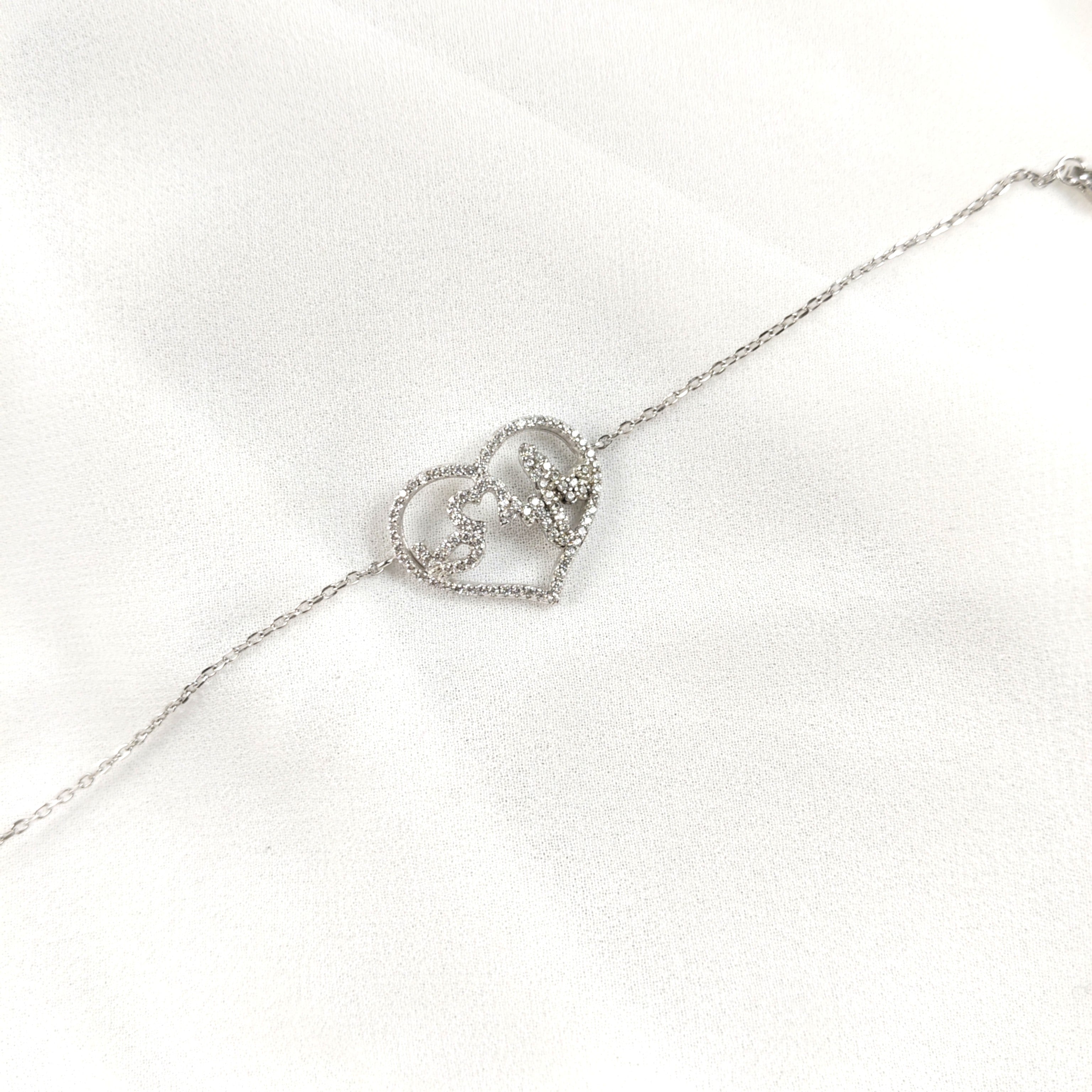 Gourmette en Argent 925 avec Double Cœur Entrelacé Gourmette en Argent 925 avec Double Cœur Entrelacé