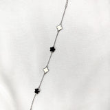 Gourmette en Argent 925 Trèfles Nacre et Onyx Gourmette en Argent 925 Trèfles Nacre et Onyx