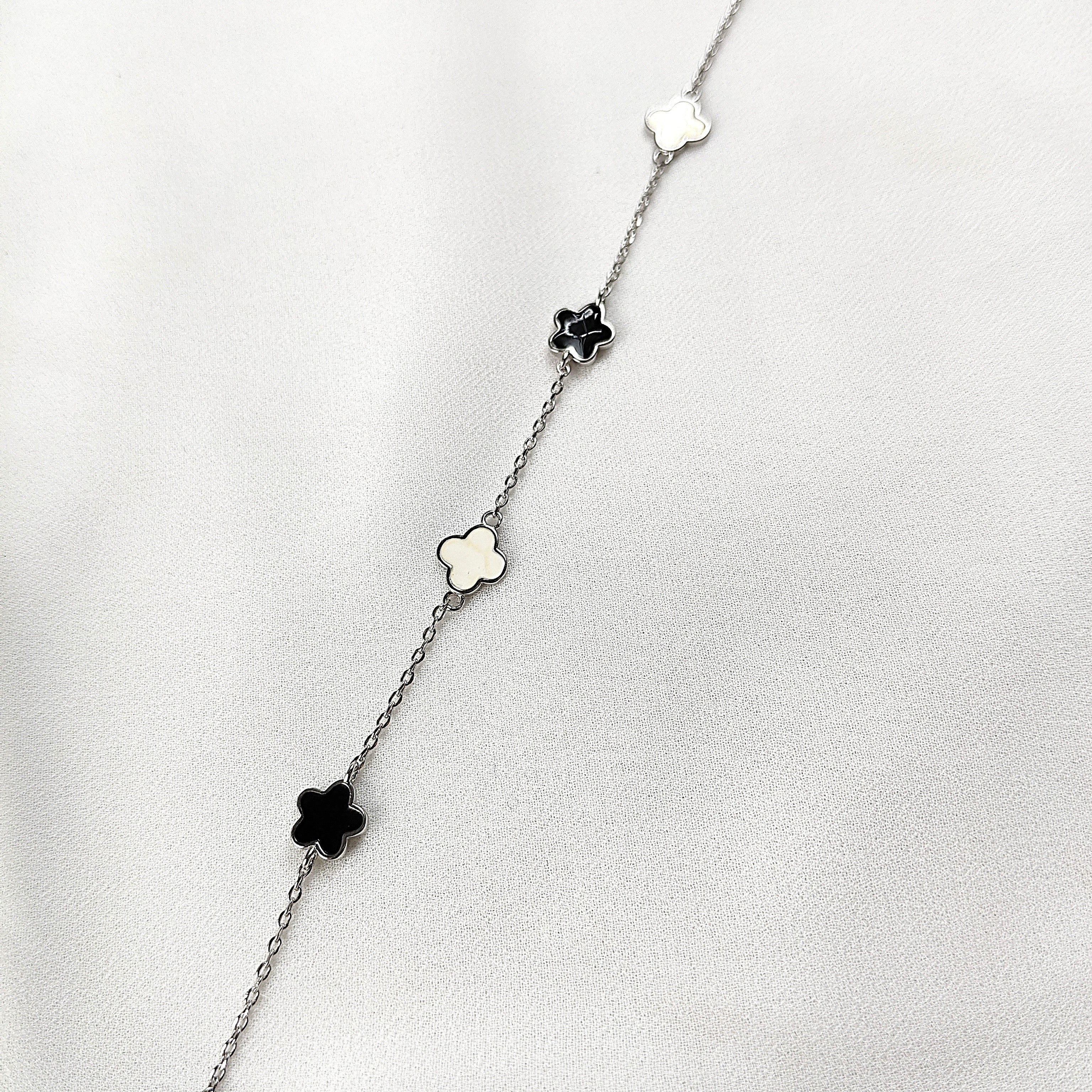 Gourmette en Argent 925 Trèfles Nacre et Onyx Gourmette en Argent 925 Trèfles Nacre et Onyx