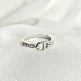 Bague en argent rhodié avec motif cercle et pavage de zircons Bague en argent rhodié avec motif cercle et pavage de zircons