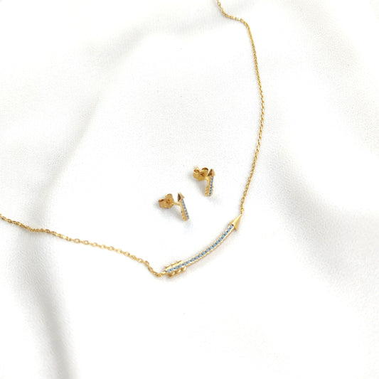 Parure en plaqué or flèche avec pierres turquoise