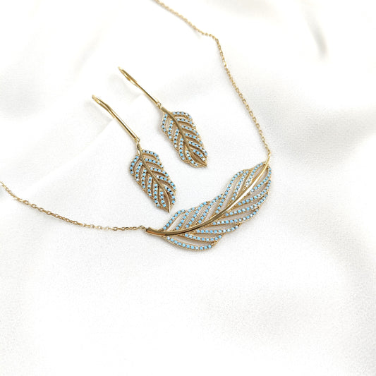 Parure en plaqué or avec zircon bleu  en forme de plume