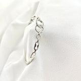 Bracelet en argent sterling avec anneaux entrelacés et zirconium Bracelet en argent sterling avec anneaux entrelacés et zirconium