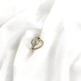 Bague en plaqué or design entrelacé pavée de zircons Bague en plaqué or design entrelacé pavée de zircons