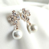Boucles d’oreilles fantaisie perles et cristaux scintillants Boucles d’oreilles fantaisie perles et cristaux scintillants