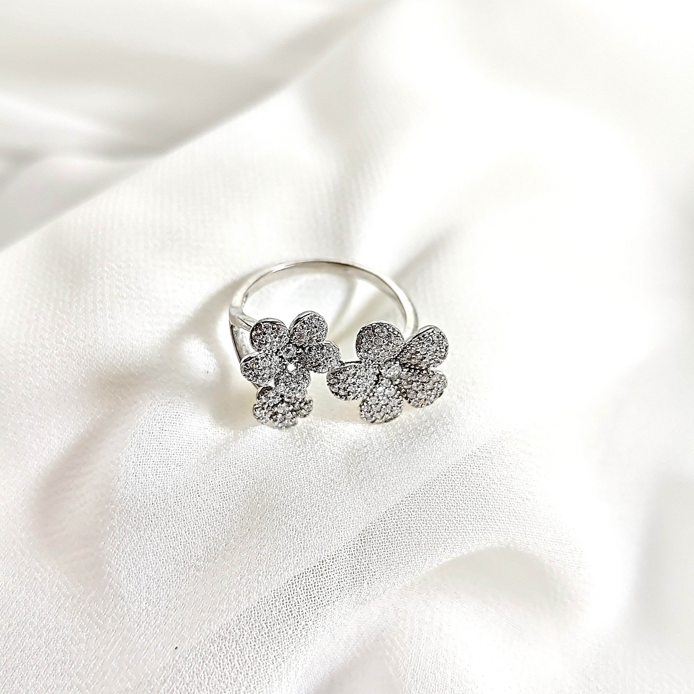 Bague en argent 925 fleurs scintillantes – Élégance florale Bague en argent 925 fleurs scintillantes – Élégance florale