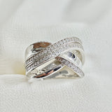 Bague en argent 925 entrelacée de zircons – Élégance Infinie Bague en argent 925 entrelacée de zircons – Élégance Infinie