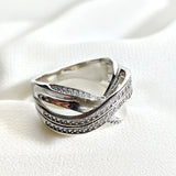 Bague en argent 925 entrelacée de zircons – Élégance Infinie Bague en argent 925 entrelacée de zircons – Élégance Infinie