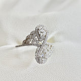 Bague en argent 925 entrelacée avec zircons – Élégance Infinie Bague en argent 925 entrelacée avec zircons – Élégance Infinie