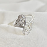 Bague en argent 925 entrelacée avec zircons – Élégance Infinie Bague en argent 925 entrelacée avec zircons – Élégance Infinie