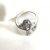 Bague en argent 925 entrelacée avec zircons – Élégance Infinie Bague en argent 925 entrelacée avec zircons – Élégance Infinie