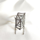 Bague en argent 925 “Toile d’Éclat” – Design arachnéen serti de zircons Bague en argent 925 “Toile d’Éclat” – Design arachnéen serti de zircons