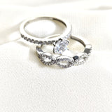 Bague en argent 925 “Éternité Brillante” – Duo d’alliance et solitaire en zircon Bague en argent 925 “Éternité Brillante” – Duo d’alliance et solitaire en zircon