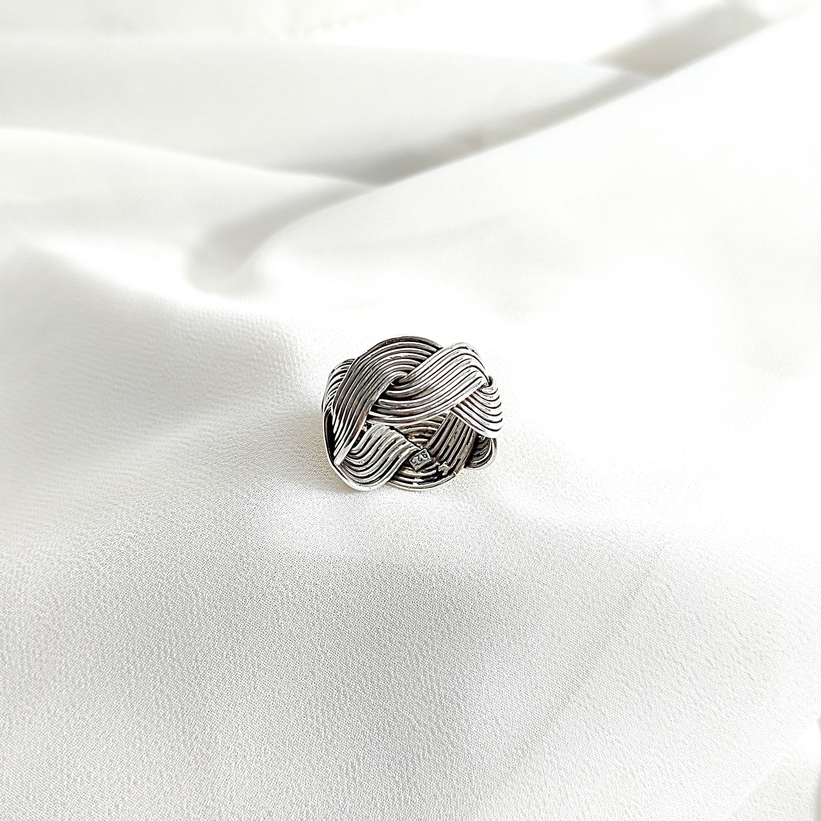 Bague en argent tressée style bohème chic Bague en argent tressée style bohème chic