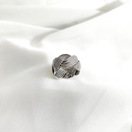 Bague en argent tressée style bohème chic