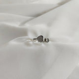Bague en argent 925 “Duo de Cœurs” – Design ouvert serti de zircons scintillants Bague en argent 925 “Duo de Cœurs” – Design ouvert serti de zircons scintillants