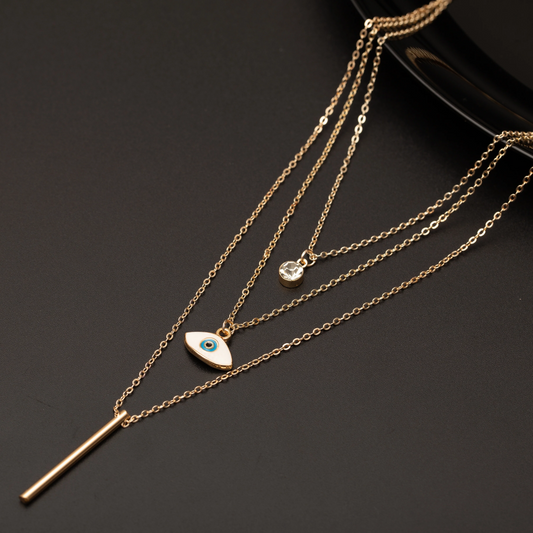 Collier Fantaisie Doré Multi-Rangs – Œil Protecteur, Barre Minimaliste et Strass