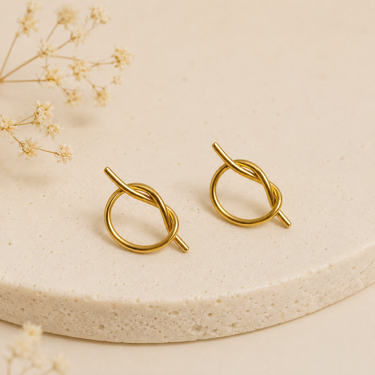 Boucles d’Oreilles Nœud Moderne en Acier Inoxydable Doré