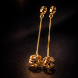 Boucles d’Oreilles Pendantes Fleur Dorée – Élégance Chic & Raffinée xuping