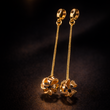 Boucles d’Oreilles Pendantes Fleur Dorée – Élégance Chic & Raffinée xuping