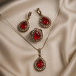 Parure en bronze et argent – Élégance royale aux pierres rouges