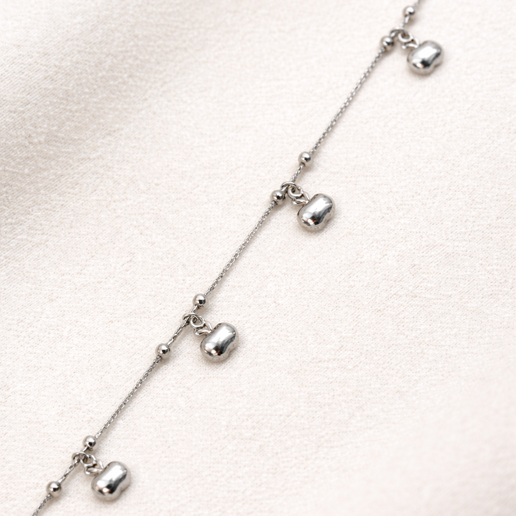 Gourmette Élégance Argentée à Breloques Pendantes