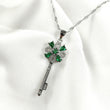 Collier Clé Fleur Émeraude en Acier Inoxydable
