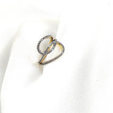 Bague en plaqué or design entrelacé pavée de zircons