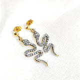 Boucles d’oreilles serpent en plaqué or pavées de zircons