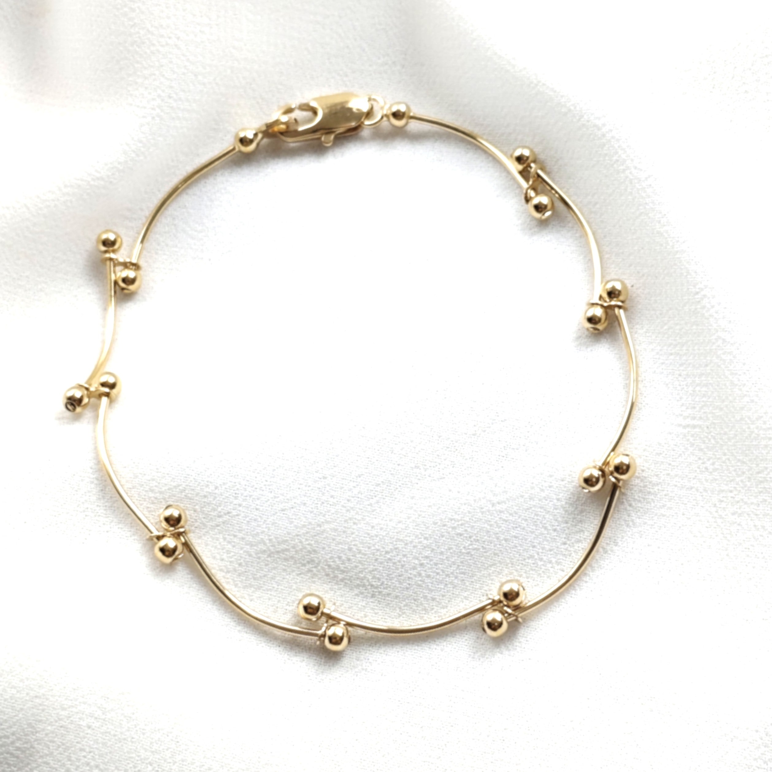 Gourmette perles ondulées en plaqué or – Garantie 10 ans