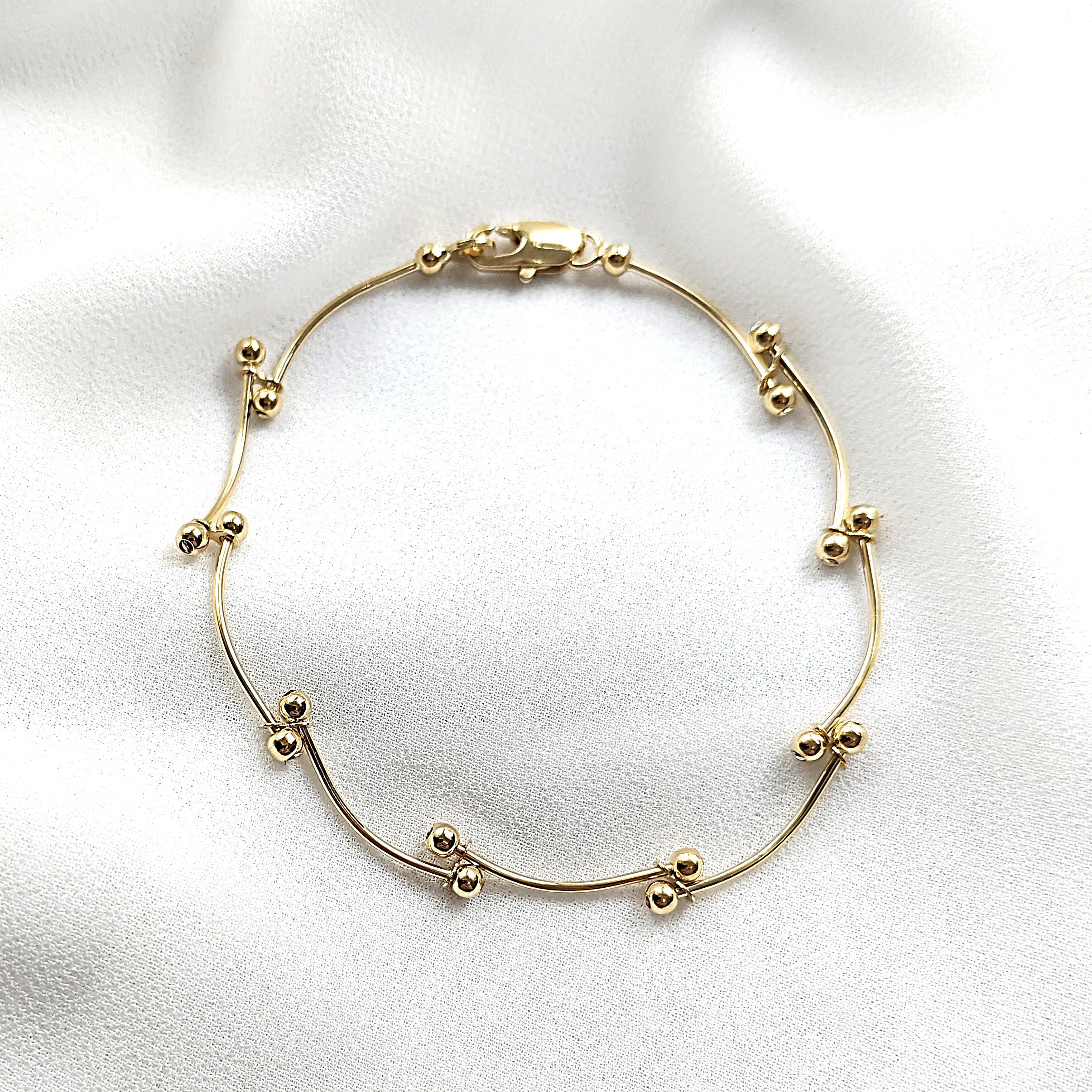 Gourmette perles ondulées en plaqué or – Garantie 10 ans