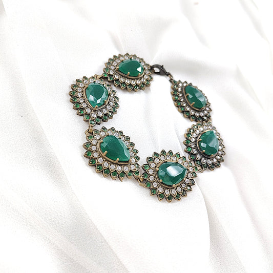 Gourmette antique en bronze et pierres vertes