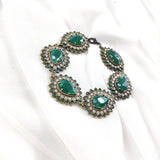 Gourmette antique en bronze et pierres vertes