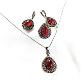 Parure en bronze et argent – Élégance royale aux pierres rouges