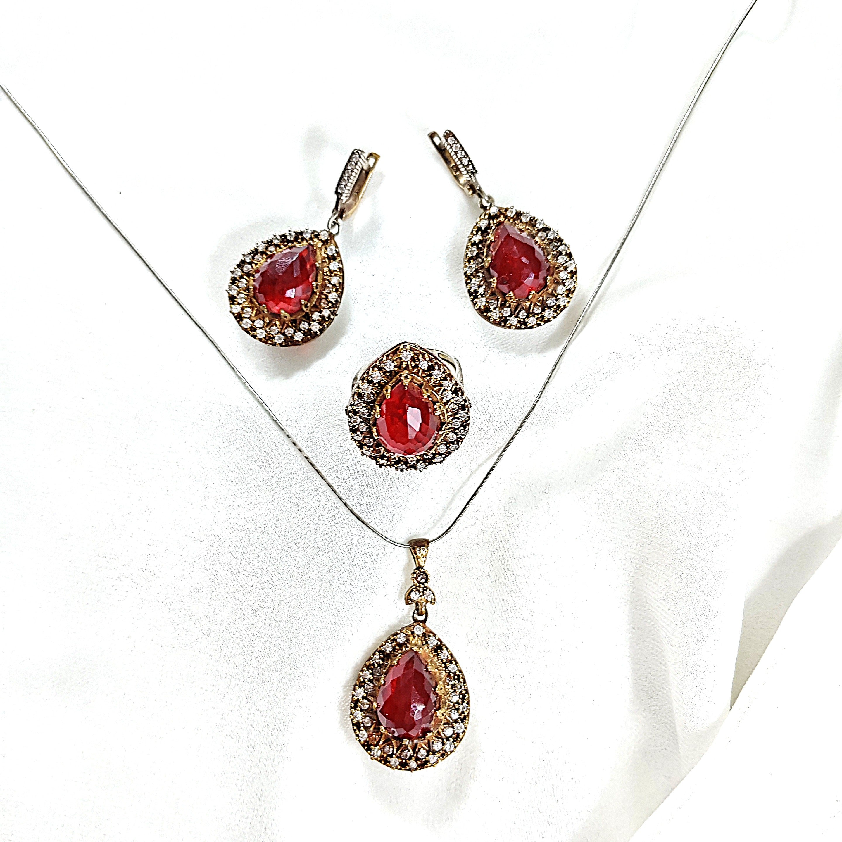 Parure en bronze et argent – Élégance royale aux pierres rouges