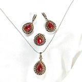 Parure en bronze et argent – Élégance royale aux pierres rouges