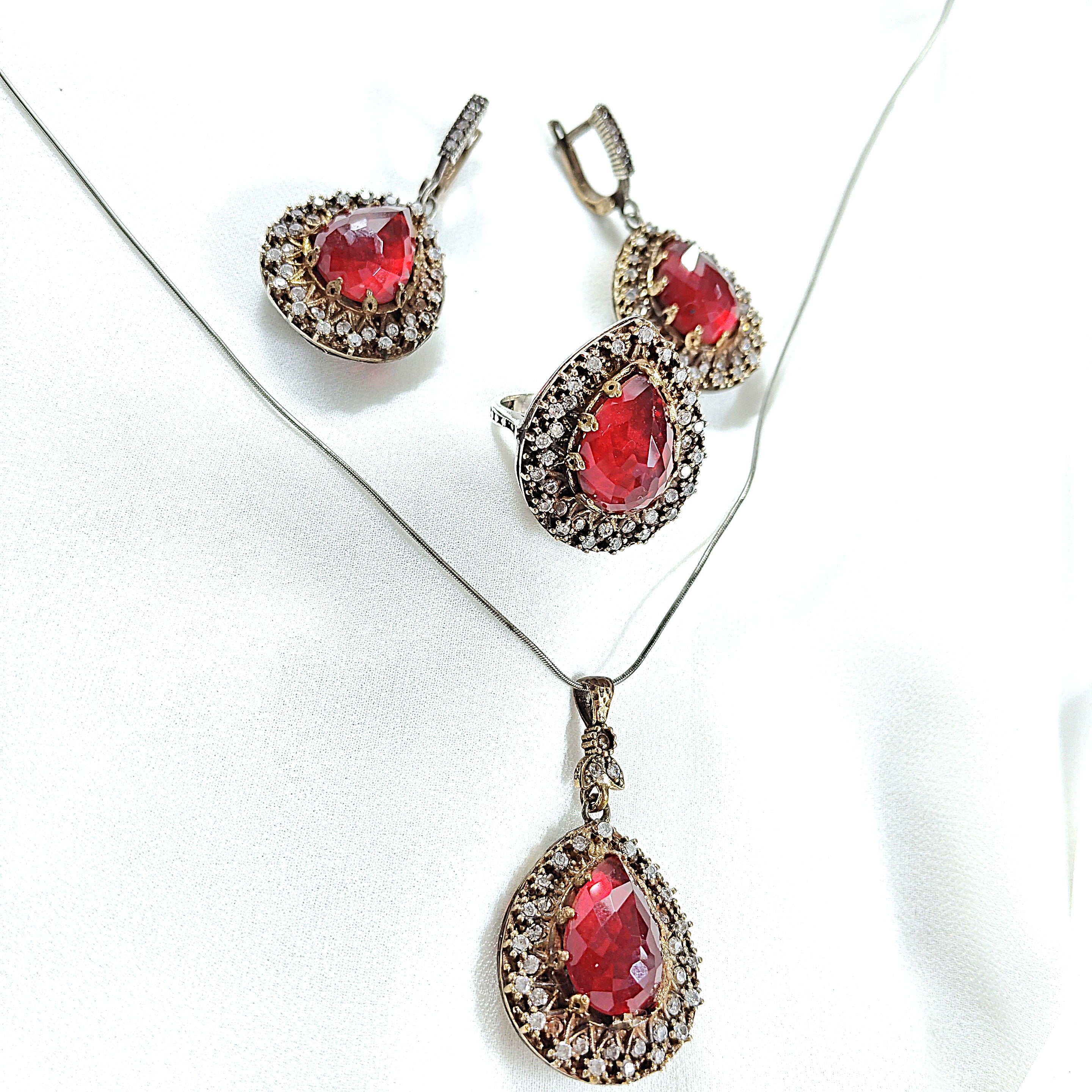Parure en bronze et argent – Élégance royale aux pierres rouges