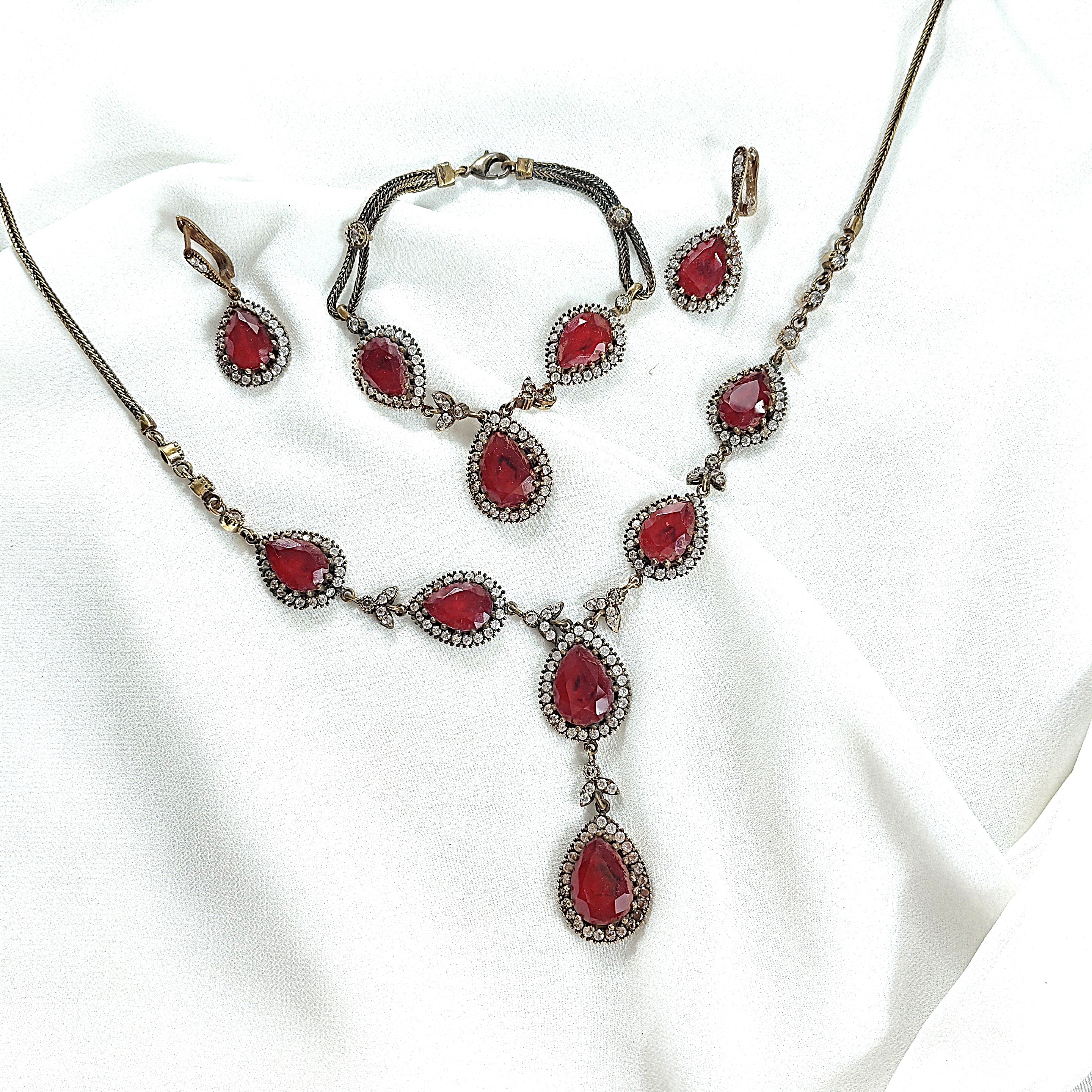 Parure en bronze et argent – Éclat impérial aux pierres rouges