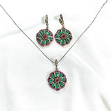 Parure en bronze et argent – Élégance florale émeraude et rubis