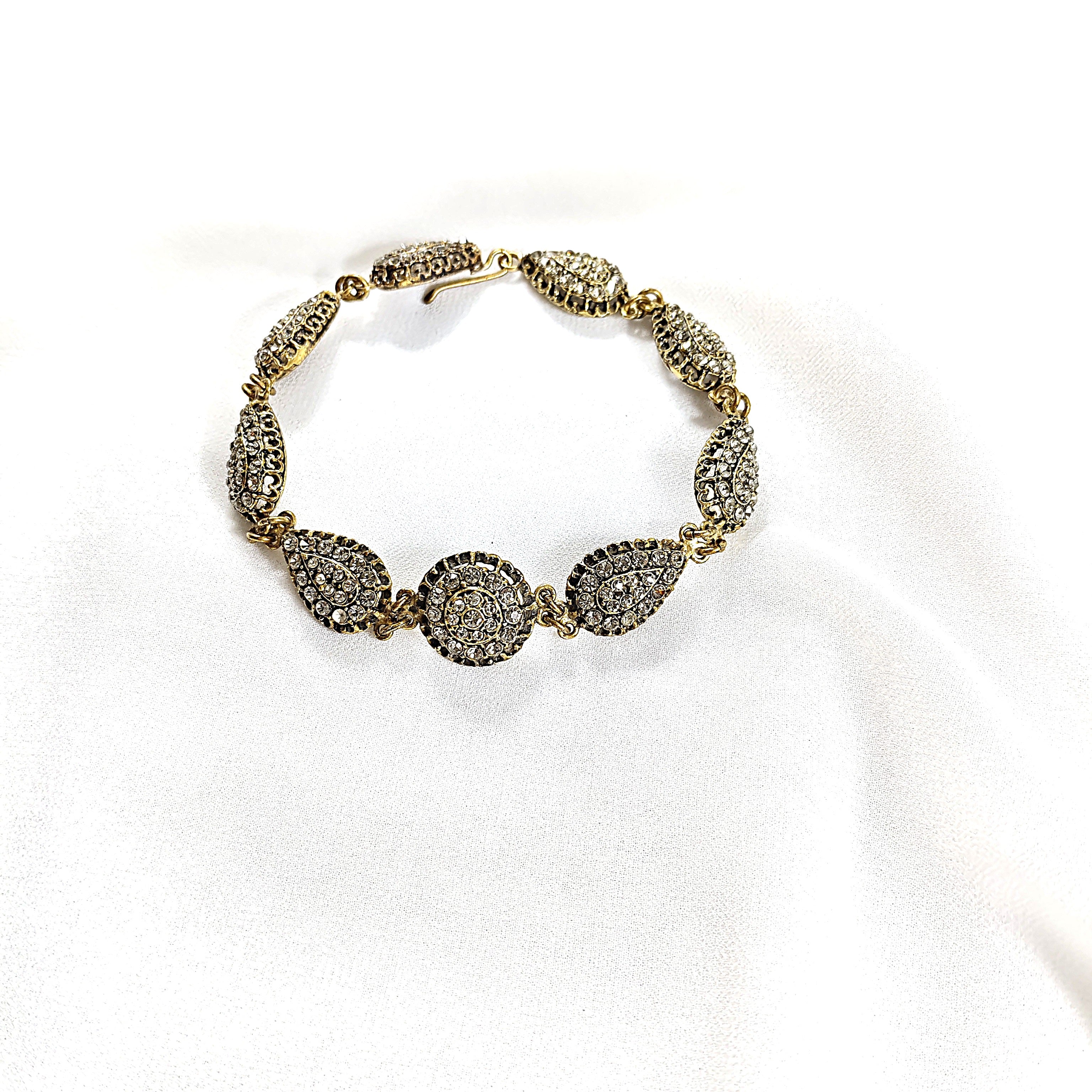 Gourmette en bronze – Élégance royale en cristal