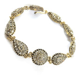 Gourmette en bronze – Élégance royale en cristal