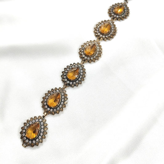 Gourmette en bronze – Élégance impériale aux pierres dorées