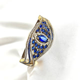 Bracelet antique – Élégance royale aux pierres bleu saphir